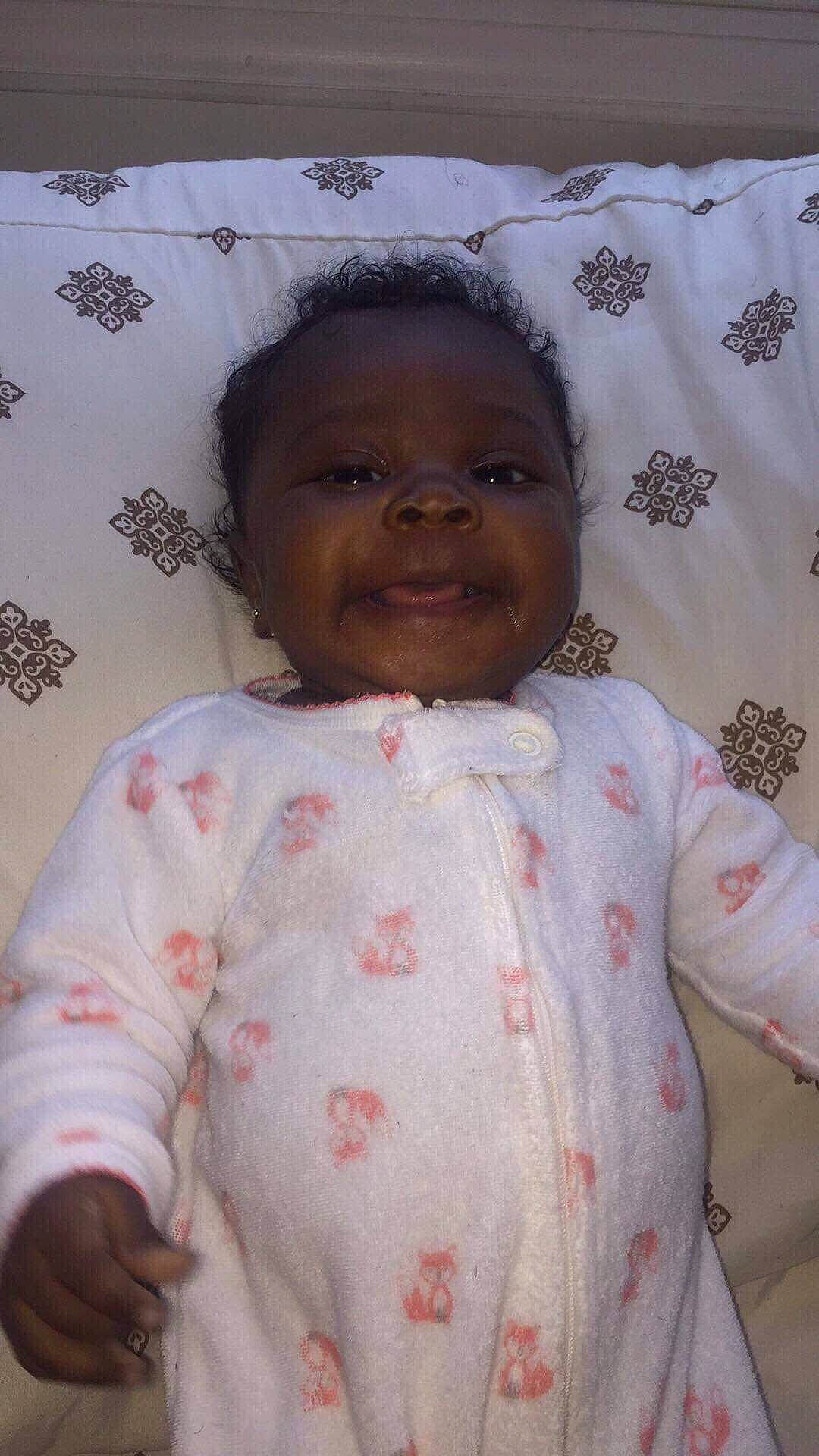 Tristan is registered to the contest to win money with this photo: baby, cheek, child, forehead, head, lip, person, skin, smile, toddler