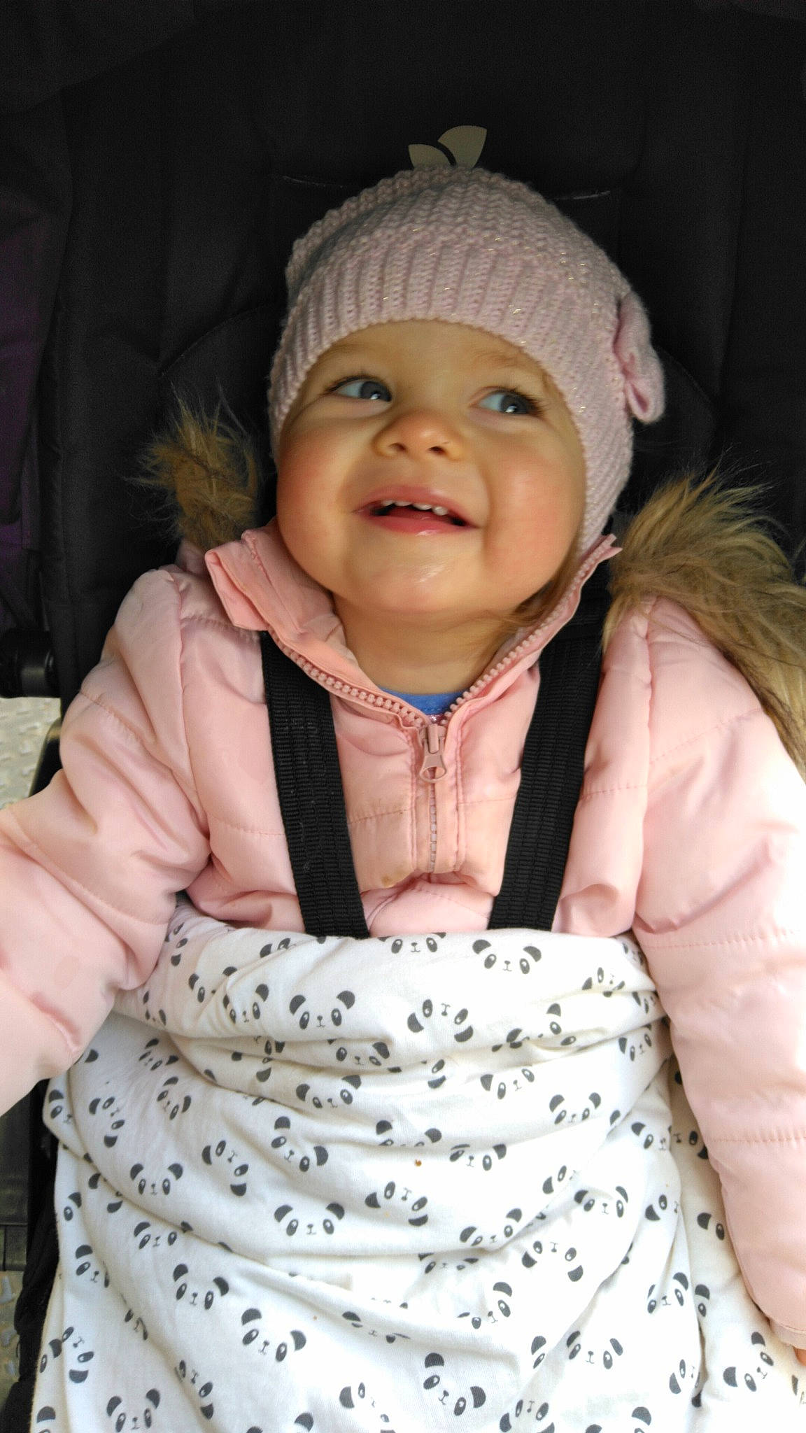 Lilou a rejoint le concours — aidez-le/la à gagner de superbes lots ! baby, baby_toddler_clothing, cap, cheek, child, dress, eye, gesture, happy, headwear, jacket, joy, lip, nose, outerwear, person, pink, skin, sleeve, smile