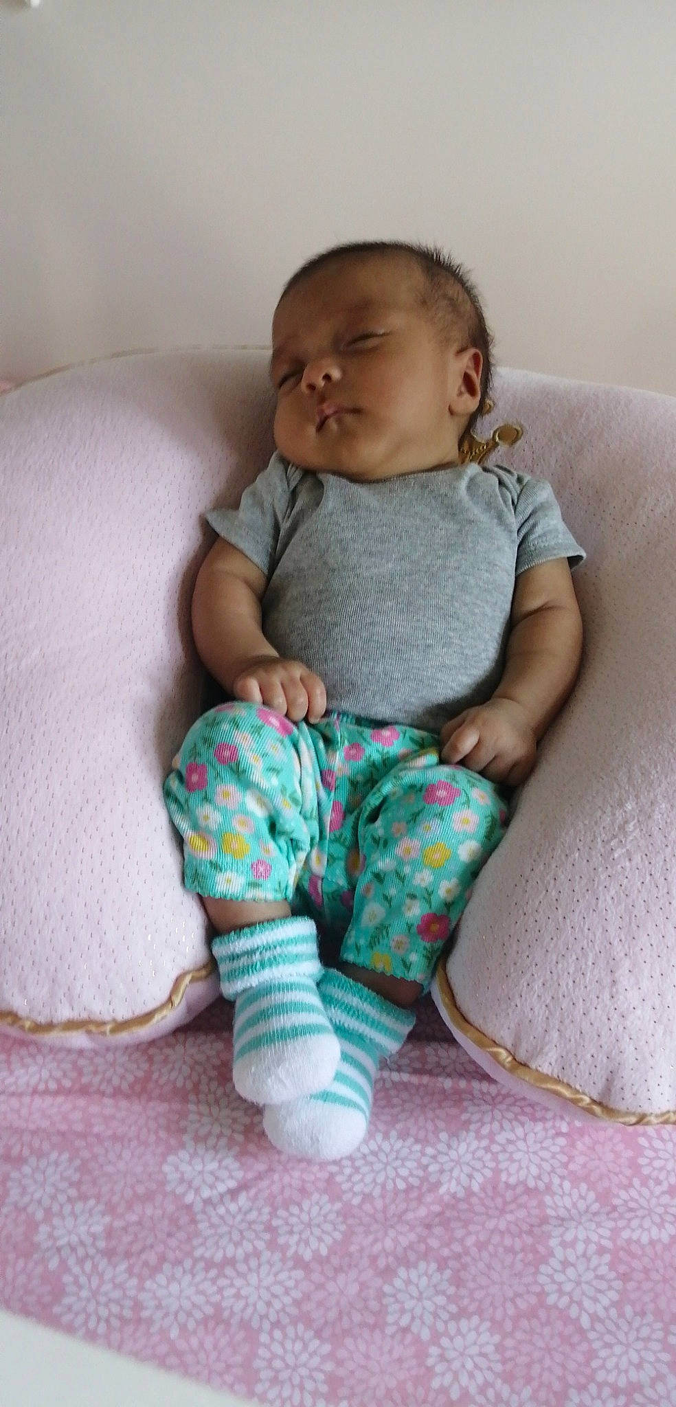 Tessa is registered to the contest to win money with this photo: baby, baby_products, baby_sleeping, baby_toddler_clothing, child, comfort, person, sitting, skin, smile, toddler, wool