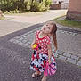 Emma participe au concours pour gagner de l'argent avec cette photo : child, girl, dress, outdoor, standing, playful, hat, sippy_cup, pavement, residential_area, greenery, sunny, shoes, polka_dot, mickey_mouse, sandals, person, smile, hair, daylight