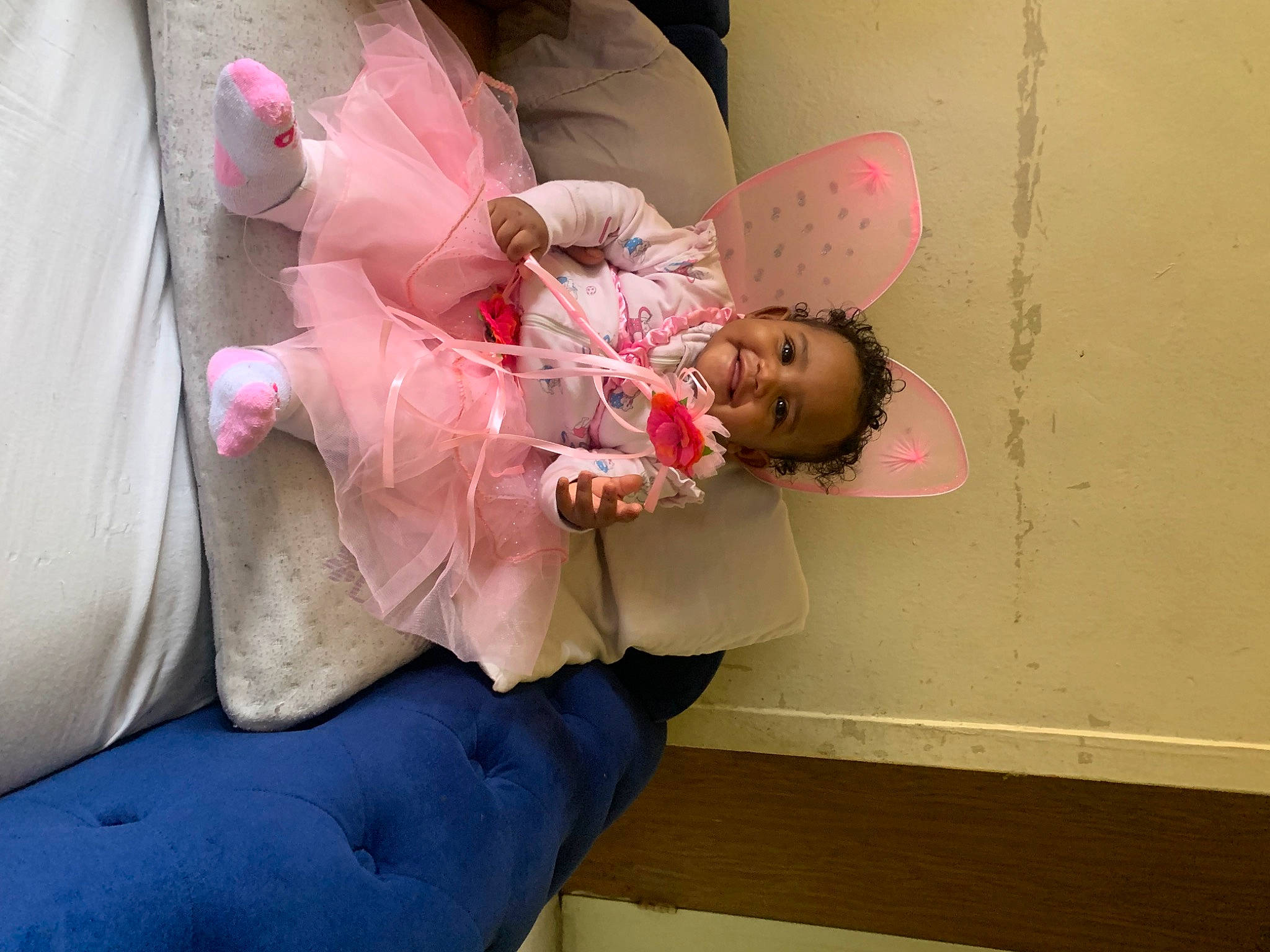 La Mya is registered to the contest to win money with this photo: baby, baby_products, child, comfort, flesh, fun, happy, human_leg, joy, knee, linens, magenta, nail, person, pink, room, sitting, thigh, toddler, window