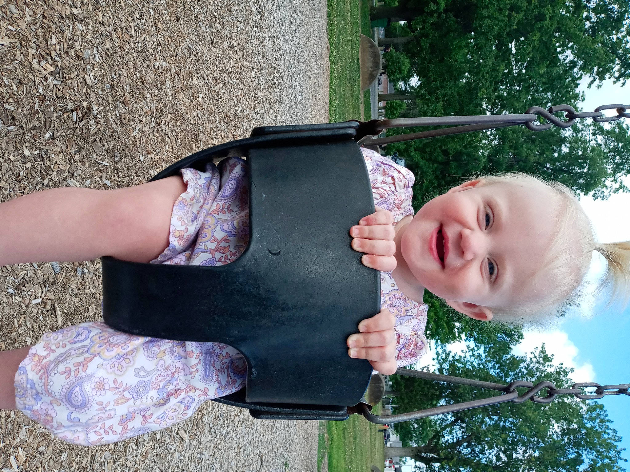 Nova Rae joined the competition — help win amazing prizes! baby_toddler_clothing, child, finger, foot, fun, grass, happy, human_leg, joy, leisure, people_in_nature, person, plant, public_space, sitting, sky, smile, thigh, thumb, toddler