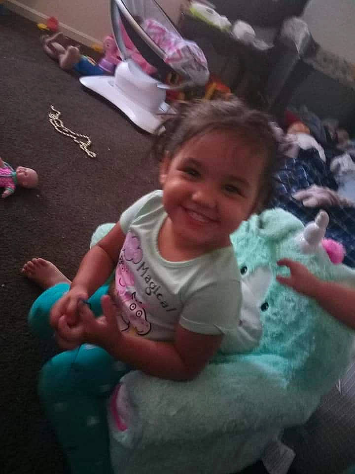 Gabriella is registered to the contest to win money with this photo: arm, baby, cheek, child, ear, fun, happy, joy, neck, people, person, pink, play, sitting, skin, smile, toddler, vacation