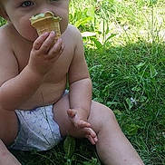 Hunter is registered to the contest to win money with this photo: arm, boy, child, eye, finger, girl, grass, green, hand, infant, lawn, leg, mouth, muscle, plant, sitting, skin, summer, toddler, trunk