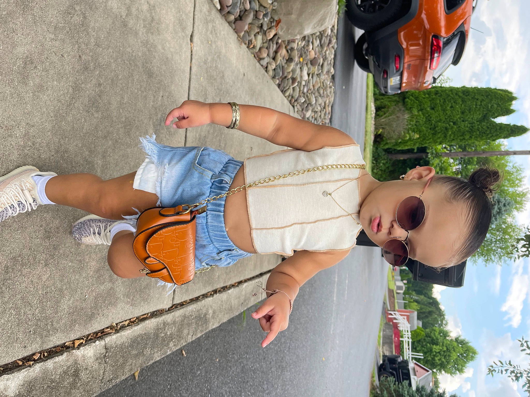 Zayla Ivettlise joined the competition — help win amazing prizes! car, child, eyewear, foot, fun, human_leg, joint, leisure, person, photograph, plant, shoe, sidewalk, sky, snapshot, sneakers, sunglasses, thigh, travel, tree