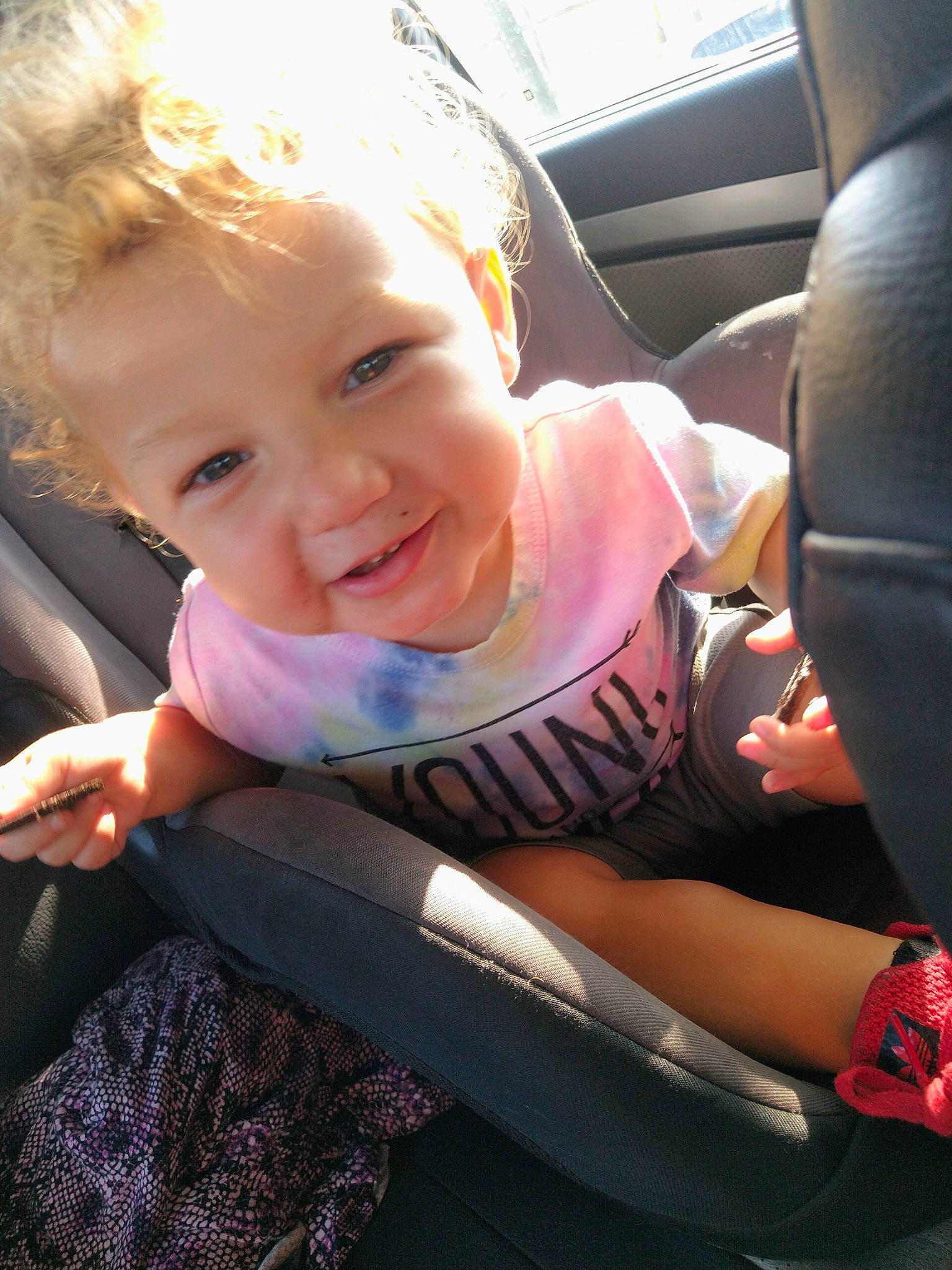 Arwyn joined the competition — help win amazing prizes! auto_part, automotive_exterior, car_seat, car_seat_cover, family_car, finger, fun, gesture, happy, lap, motor_vehicle, person, skin, smile, steering_wheel, t_shirt, thumb, toddler, vehicle_door, window