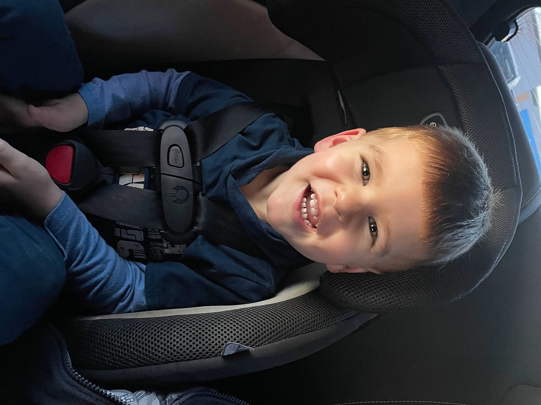 Steven is registered to the contest to win money with this photo: auto_part, automotive_design, automotive_wheel_system, baby, car_seat, car_seat_cover, child, comfort, electric_blue, family_car, flash_photography, fun, head, head_restraint, joy, luxury_vehicle, motor_vehicle, person, personal_luxury_car, smile