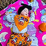Aurora joined the competition — help win amazing prizes! autumn, baby, black_headband, blanket, child, costume, cute, fall, festive, flower, halloween, hay, hello_kitty, orange, outdoor, patterned_clothing, pumpkin, sleeping, soft_toys, striped_socks