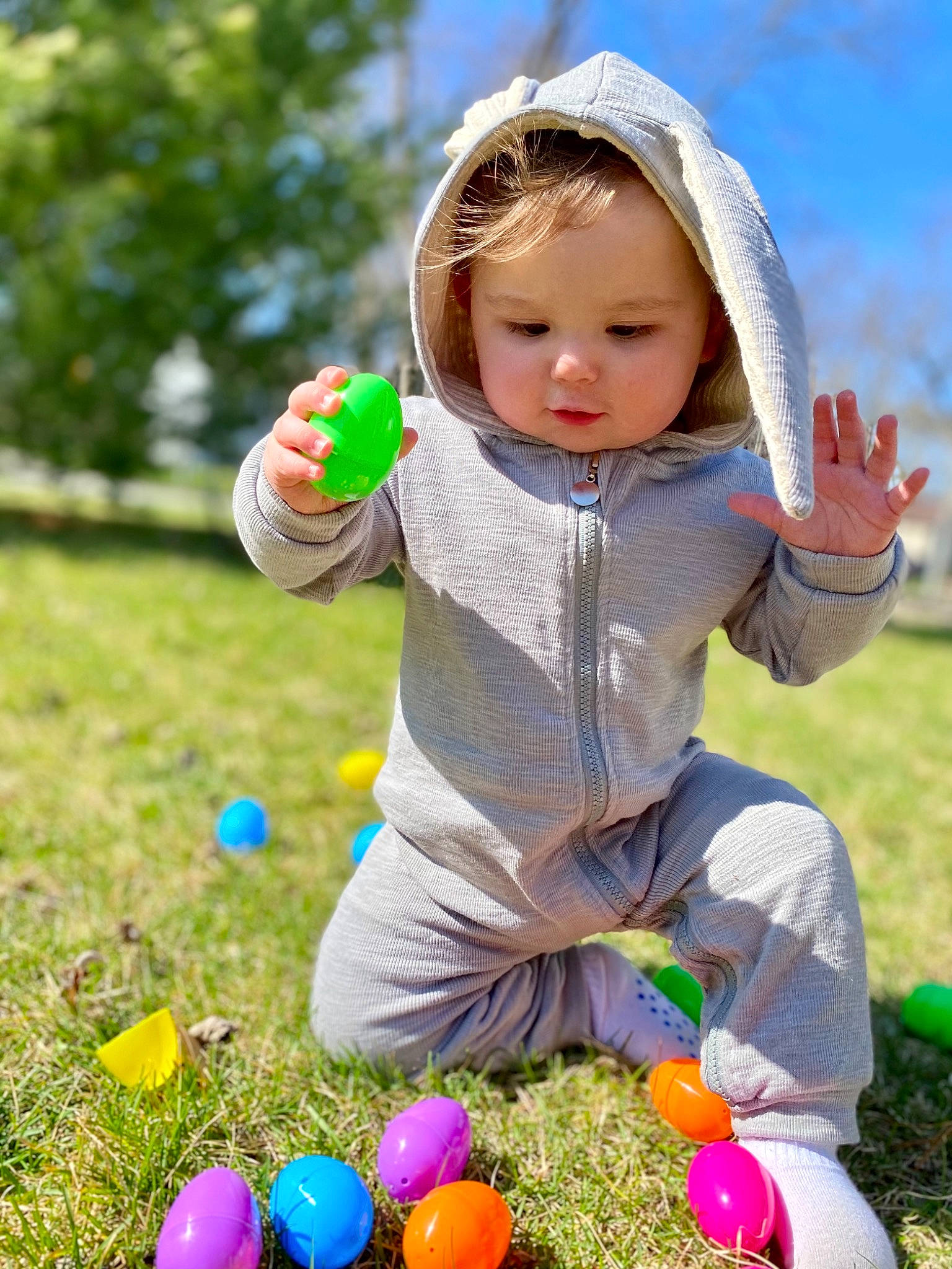 Carter James is registered to the contest to win money with this photo: baby_toddler_clothing, beauty, child, daytime, easter, easter_egg, fun, grass, grass_family, happy, headwear, leisure, light, people_in_nature, person, photograph, plant, recreation, summer, sunlight