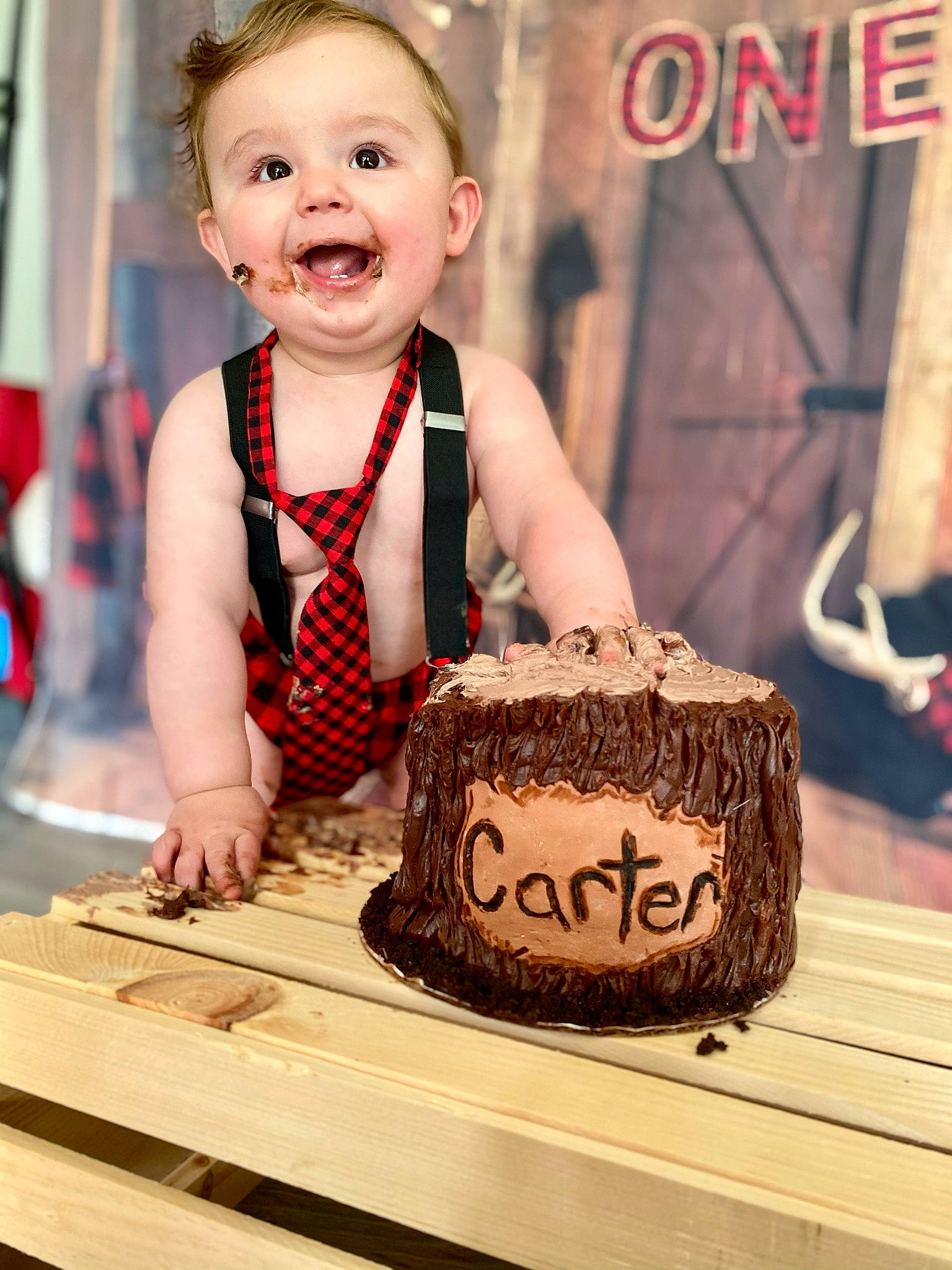 Carter James joined the competition — help win amazing prizes! baby, baby_toddler_clothing, baked_goods, birthday_cake, cake, cake_decorating, cake_decorating_supply, cuisine, food, happy, icing, orange, person, plate, smile, sugar_cake, table, tableware, tie, toddler
