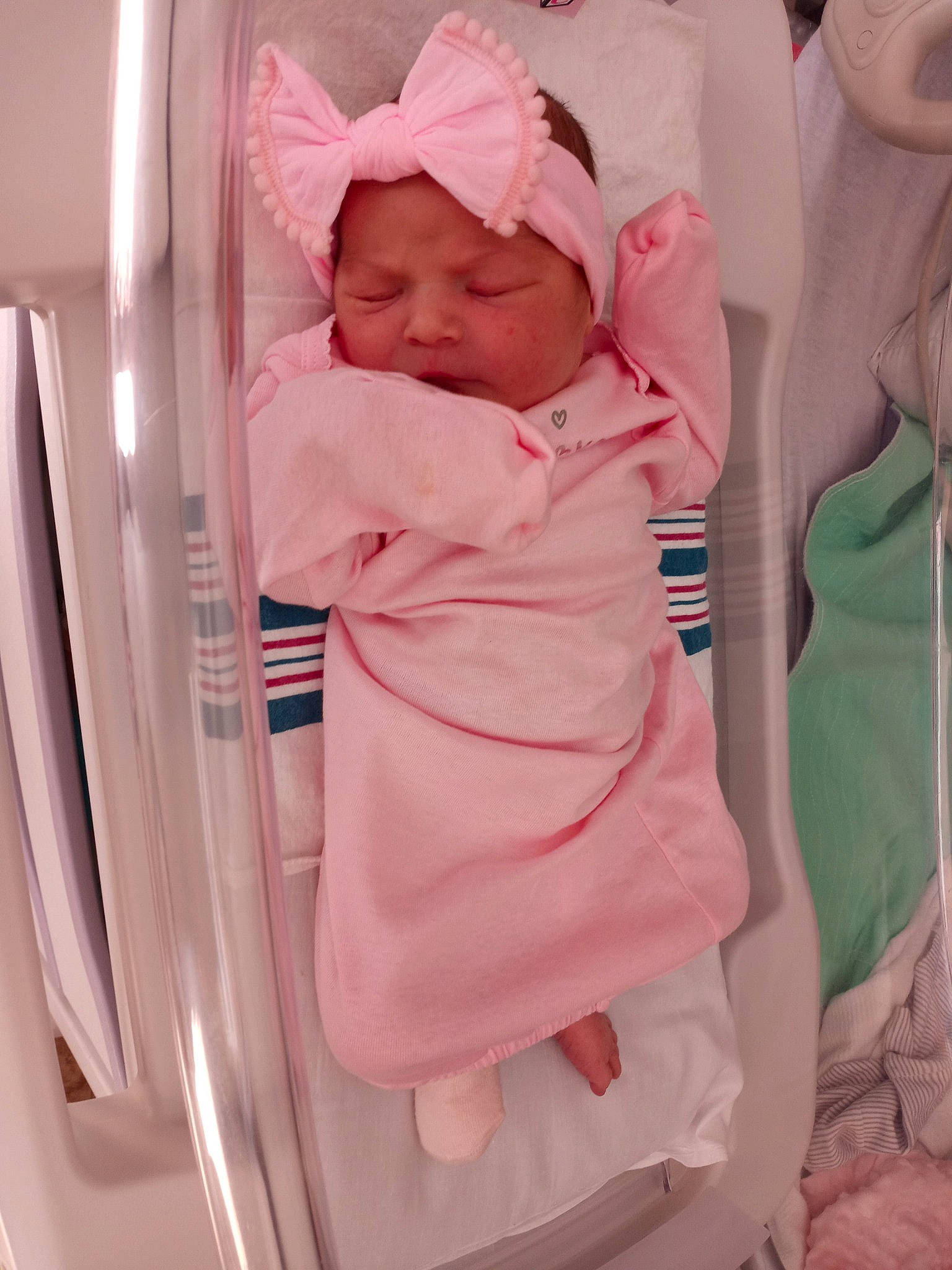 Layla joined the competition — help win amazing prizes! baby, baby_carriage, baby_products, baby_safety, baby_sleeping, baby_toddler_clothing, cap, child, comfort, cradle, hat, headwear, infant_bed, linens, magenta, person, pink, room, sleeve, t_shirt