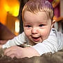 baby, child, smiling, crawling, face, indoor, soft_light, happy, closeup, person, infant, portrait, cute, young, expression, warm_colors, blurry_background, long_sleeves, skin, head