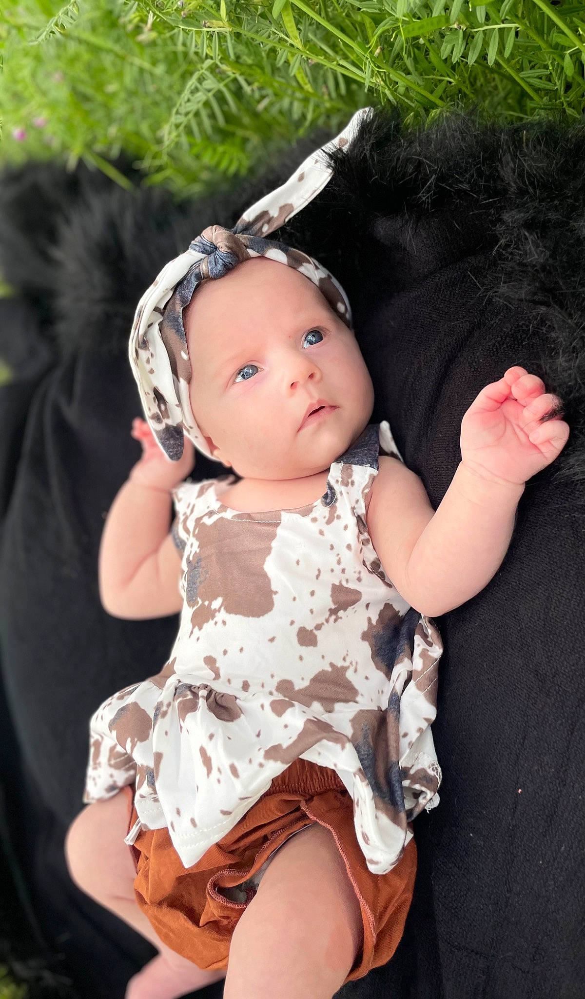Lakelynn is registered to the contest to win money with this photo: baby, baby_toddler_clothing, black_hair, costume_hat, dress, embellishment, eyelash, flash_photography, grass, green, happy, headband, headpiece, headwear, iris, jewellery, lip, mammal, person, pink