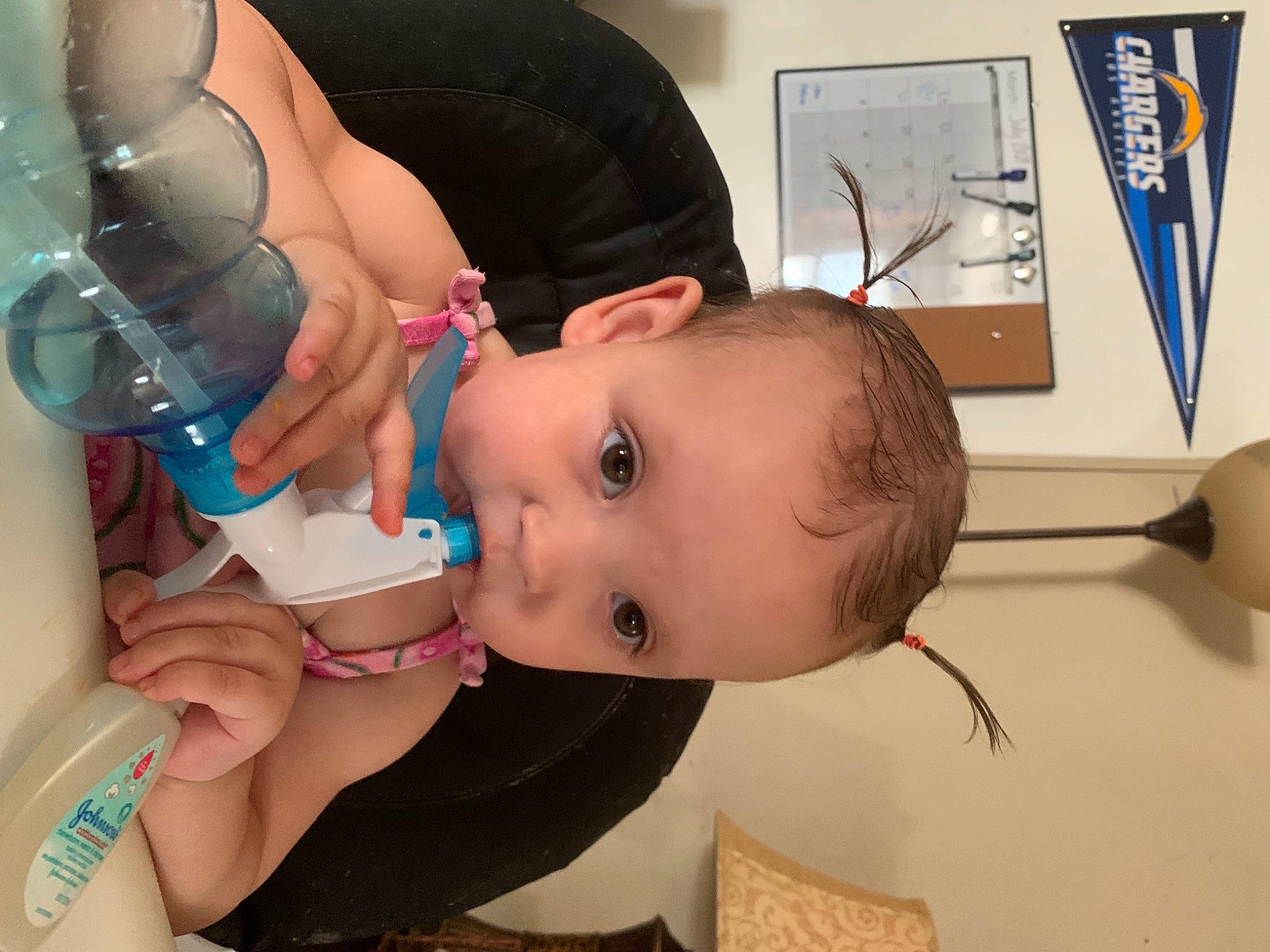 Ariya is registered to the contest to win money with this photo: baby, baby_bottle, bottle, cheek, chest, drinkware, ear, eyebrow, eyelash, finger, fluid, hand, joint, mouth, nail, nose, person, plastic_bottle, skin, toddler