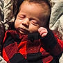 baby, sleeping, infant, blanket, clothing, red, black, pattern, cozy, cute, portrait, newborn, face, skin, hand, warm, soft, peaceful, relax, indoors