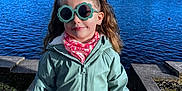 Camélia a rejoint le concours — aidez-le/la à gagner de superbes lots ! accessories, child, clothing, coat, face, female, girl, head, hood, jacket, lake, nature, outdoors, person, photography, portrait, scenery, sunglasses, water, waterfront