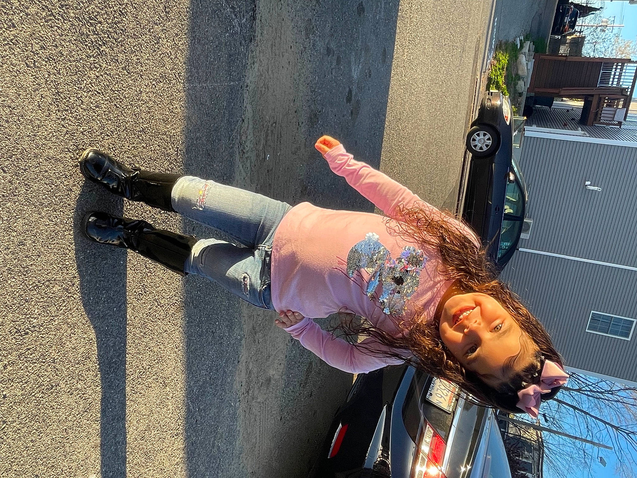 Leylani is registered to the contest to win money with this photo: arm, art, asphalt, cool, elbow, eyewear, hand, human_body, human_leg, joy, knee, leg, pattern, person, road, road_surface, sidewalk, sock, street_fashion, thigh