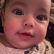 Jouri joined the competition — help win amazing prizes! baby, close_up, face, infant, child, pink_clothing, minnie_mouse, cartoon_print, cute, adorable, expression, portrait, young_child, eyelashes, soft_lighting, indoor, sleepwear, smile, chubby_cheeks, head