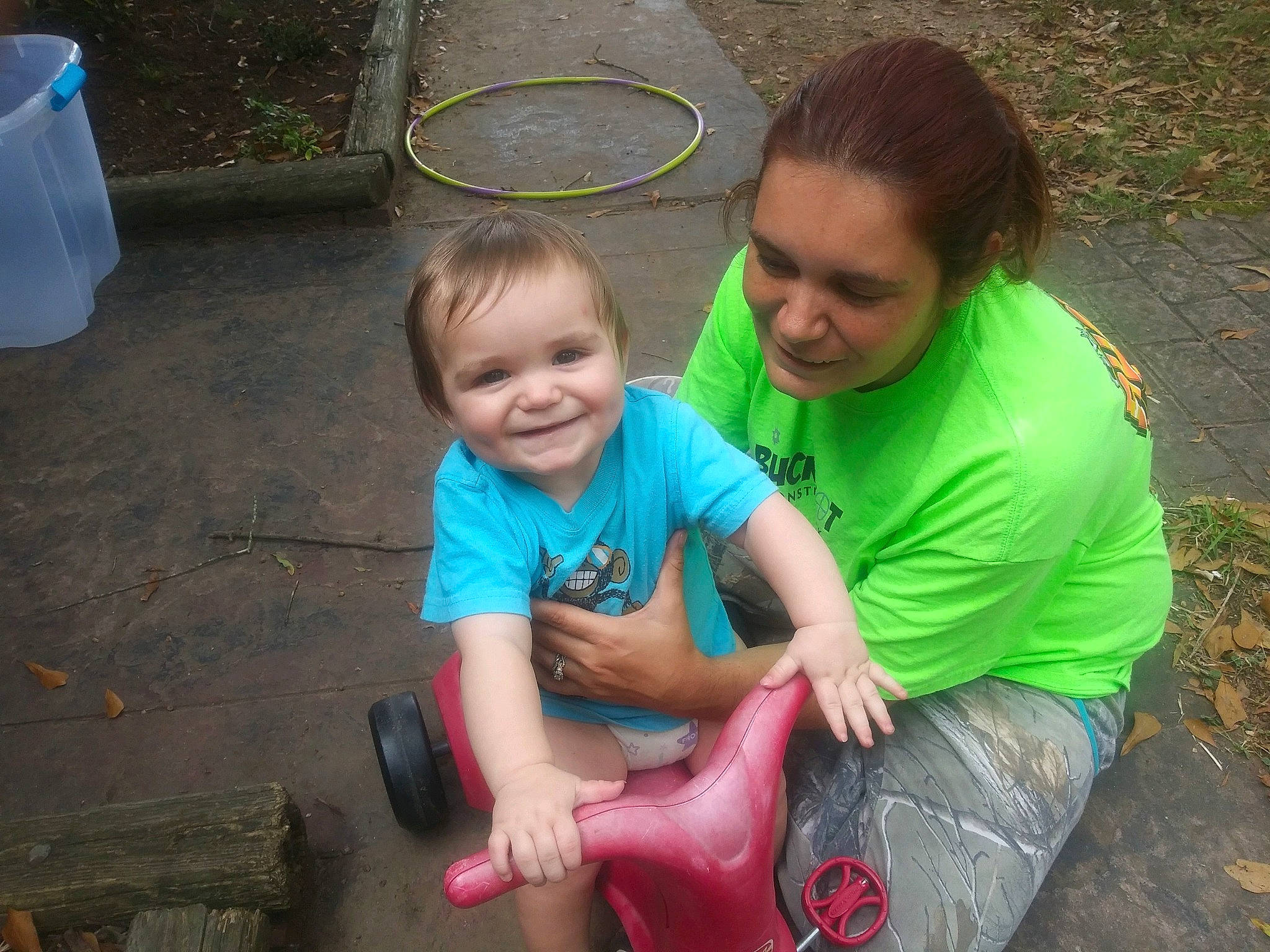 Dalton joined the competition — help win amazing prizes! child, event, fun, grass, green, happy, joy, lap, lawn, leisure, people_in_nature, person, play, recreation, sitting, smile, soil, t_shirt, tire, toddler