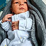Nathan participe au concours pour gagner de l'argent avec cette photo : baby, newborn, infant, blanket, white_clothing, stars_pattern, cozy, sleepwear, cute, face, hands, portrait, indoor, soft_texture, child, young, resting, wrapped, adorable, peaceful