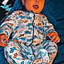 Steven joined the competition — help win amazing prizes! baby, infant, child, onesie, pajamas, dog_pattern, blanket, bed, blue_sheet, smiling, tongue_out, lying_down, hands, feet, portrait, cute, cozy, sleepwear, nursery, fabric