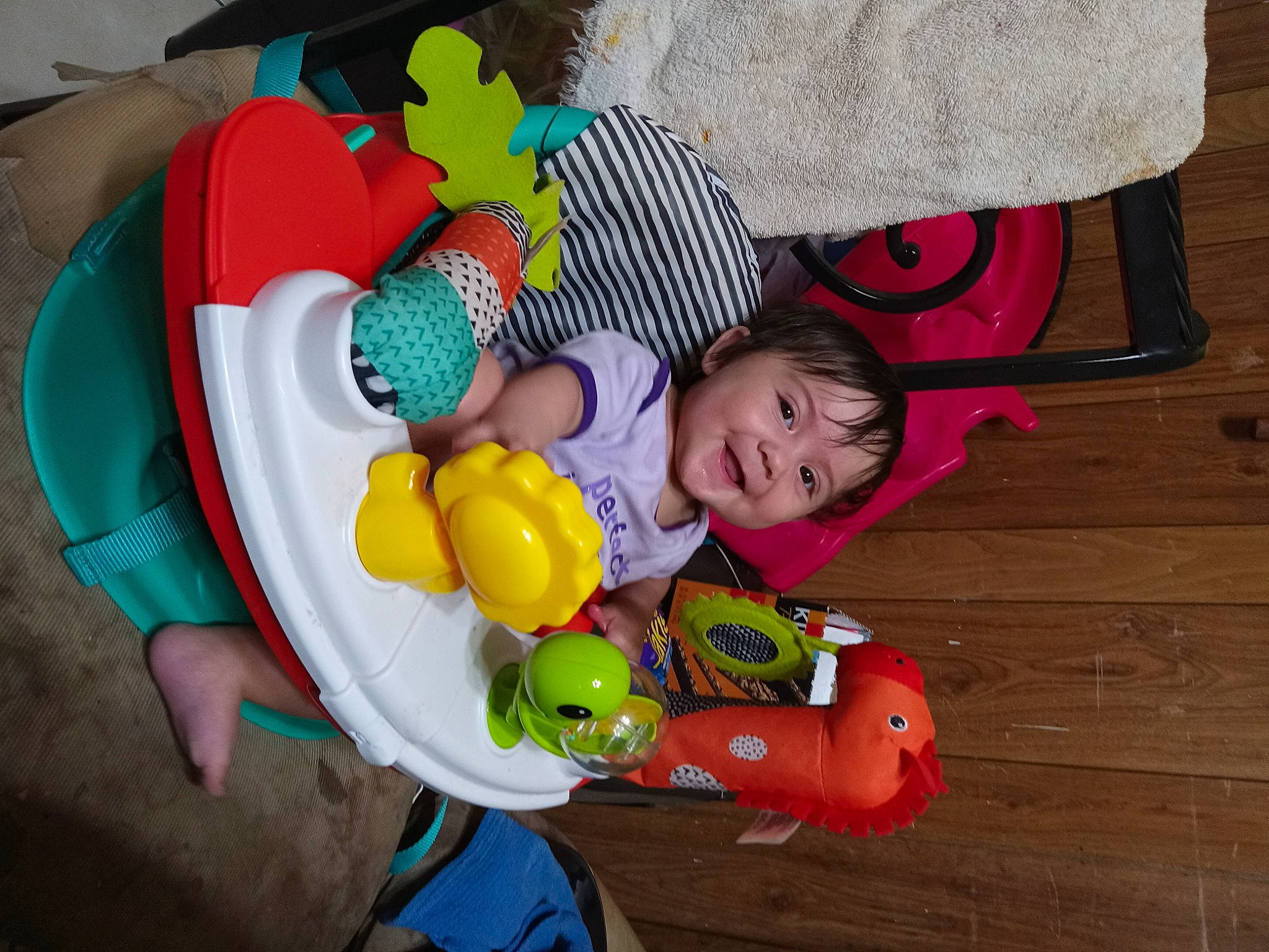 Selina is registered to the contest to win money with this photo: baby, baby_products, baby_safety, baby_sleeping, baby_toddler_clothing, baby_toys, bedtime, child, comfort, flooring, fun, happy, joy, linens, person, play, room, sitting, stuffed_toy, toddler