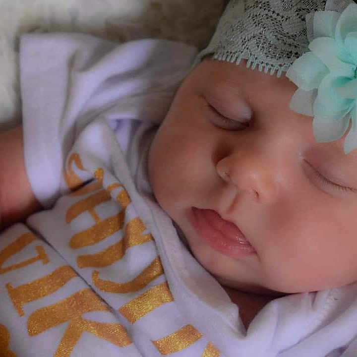Harleigh joined the competition — help win amazing prizes! baby, baby_sleeping, bedtime, birth, cheek, child, close_up, eye, face, hair_accessory, hand, headgear, mouth, nap, nose, skin, sleep, toddler