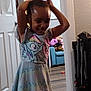 Bella joined the competition — help win amazing prizes! casual, child, clothing, colorful, cute, door, dress, floor, furniture, girl, hair, happy, indoor, living_room, person, playful, room, smiling, toy, young