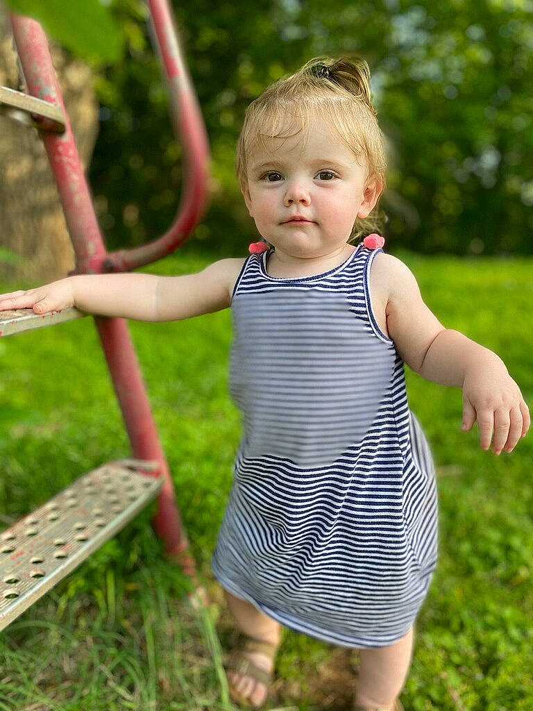 Suzanne Curtz joined the competition — help win amazing prizes! baby, baby_toddler_clothing, blond, child, day_dress, electric_blue, fun, grass, grass_family, happy, leisure, one_piece_garment, pattern, people_in_nature, person, recreation, sleeve, spring, toddler, tree