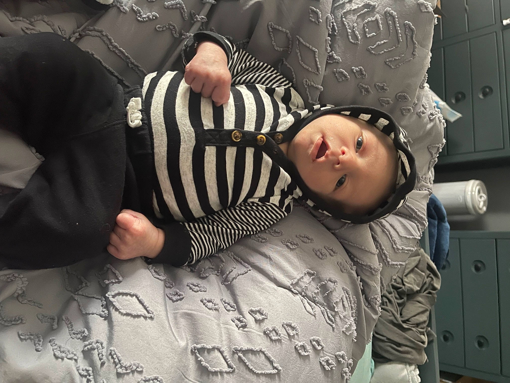 Ezekiel joined the competition — help win amazing prizes! bedding, cabinetry, child, comfort, cool, flash_photography, font, fun, happy, human, linens, monochrome, monochrome_photography, pattern, people, person, portrait_photography, room, sitting, sleeve