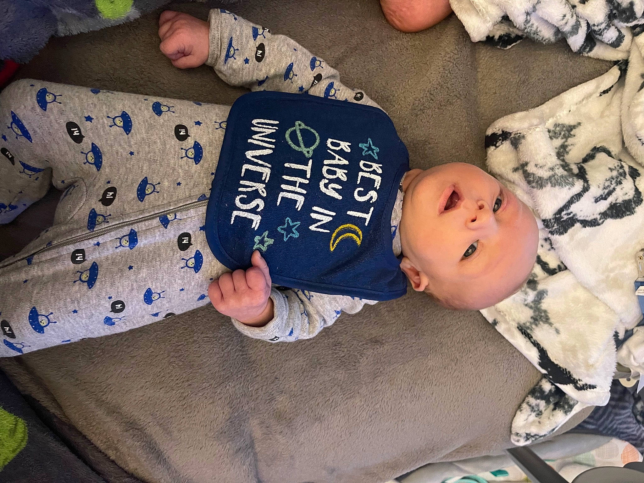 Ezekiel joined the competition — help win amazing prizes! baby, baby_toddler_clothing, child, comfort, finger, hand, hat, linens, pattern, person, room, sitting, sleeve, textile, toddler, toy, wood