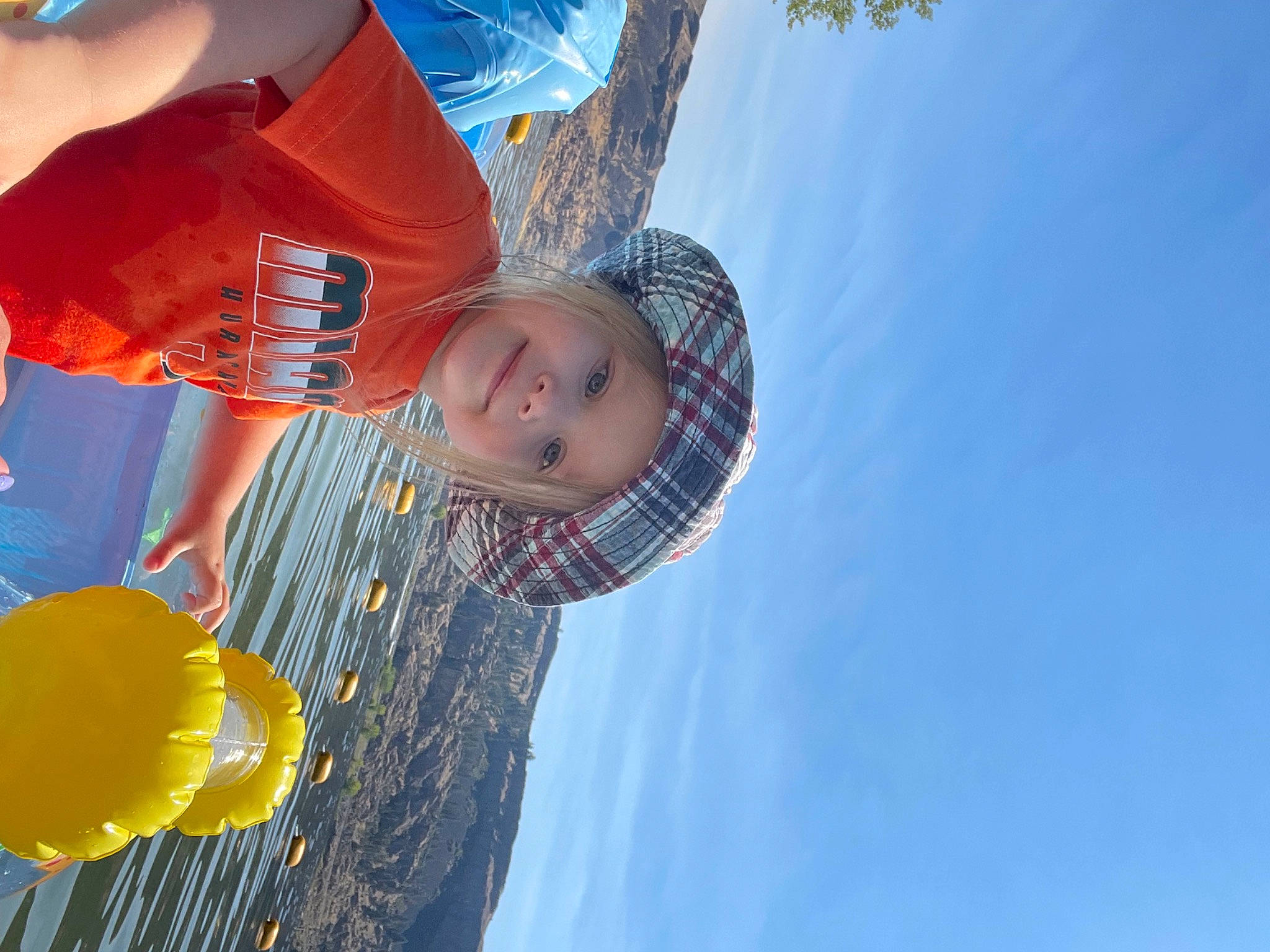 Karina is registered to the contest to win money with this photo: azure, balloon, blue, child, cloud, electric_blue, facial_expression, fun, happy, headgear, headwear, human_body, joy, leisure, people_in_nature, person, recreation, sky, smile, toddler