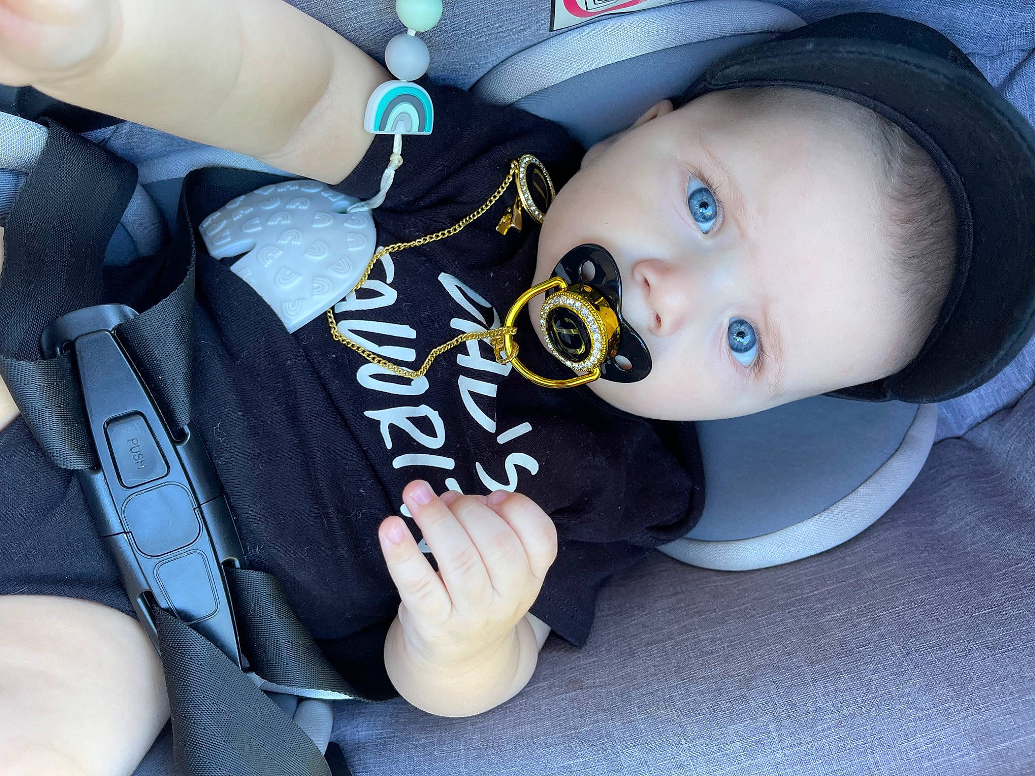 David joined the competition — help win amazing prizes! auto_part, automotive_wheel_system, baby, baby_carriage, baby_products, baby_safety, baby_toddler_clothing, car_seat, child, comfort, electric_blue, family_car, hat, luxury_vehicle, person, personal_protective_equipment, sitting, sleeve, toddler