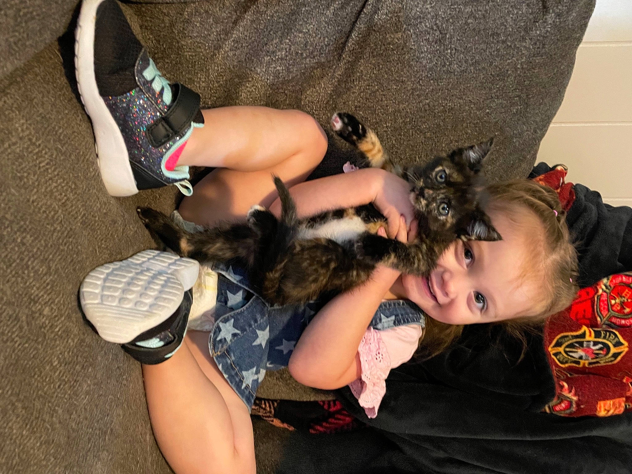 Autumn is registered to the contest to win money with this photo: arm, black, calf, event, fawn, foot, fun, fur, happy, human_leg, joint, joy, knee, leg, pattern, person, shoe, shorts, street_fashion, thigh