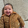Owen joined the competition — help win amazing prizes! baby, smiling, jacket, quilted, brown, couch, fabric, texture, happy, infant, child, clothing, portrait, indoor, cute, person, face, head, warm, cozy