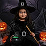 black_dress, black_hat, broom, cauldron, child, costume, decorations, girl, green_liquid, halloween, indoor, jack_o_lantern, long_hair, portrait, pumpkin, purple_skirt, smile, spider_web, spooky, witch_costume