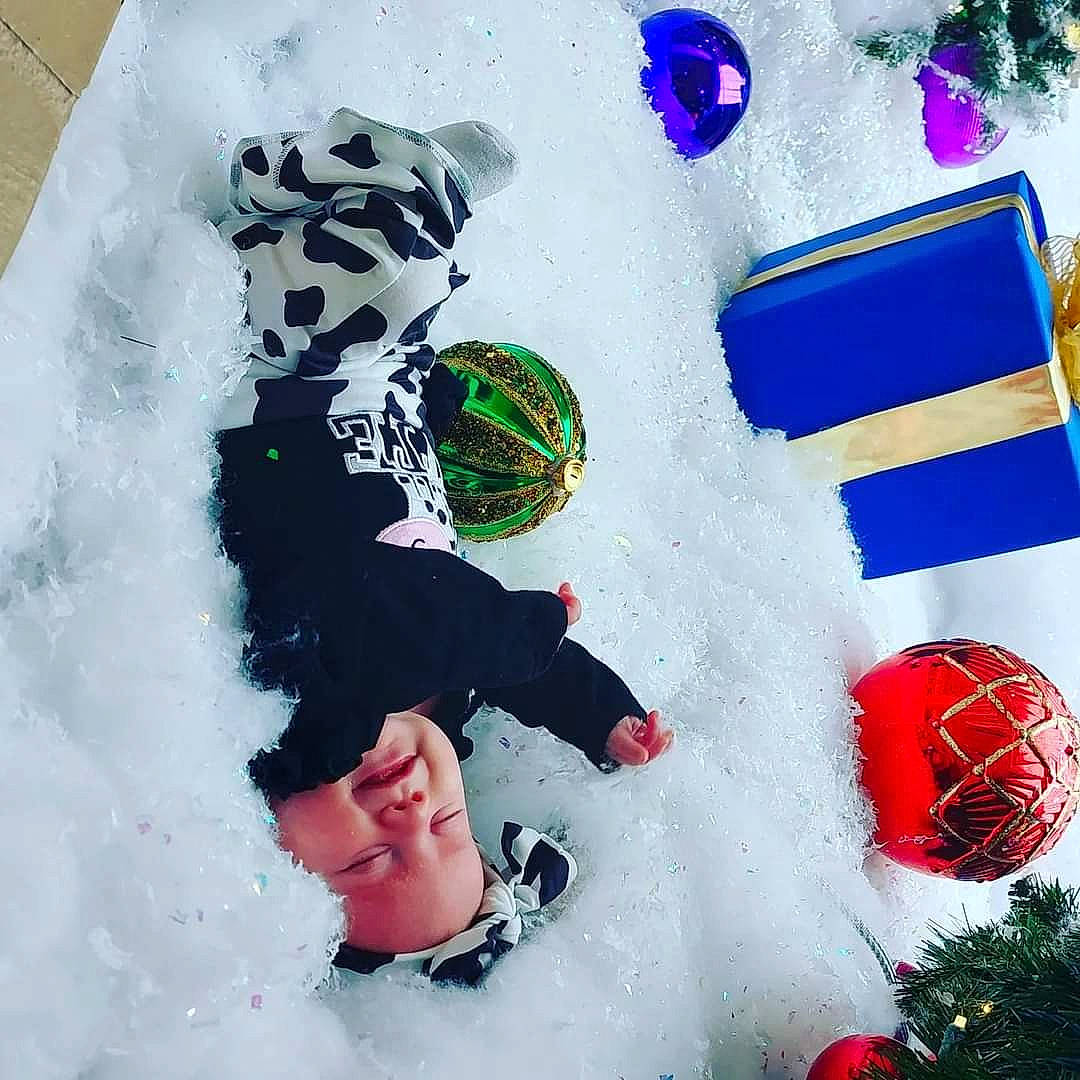 Athena joined the competition — help win amazing prizes! art, carmine, christmas_ornament, circle, event, freezing, fun, happy, hat, holiday, ornament, pattern, people_in_nature, person, photograph, playing_in_the_snow, recreation, snow, toddler, winter