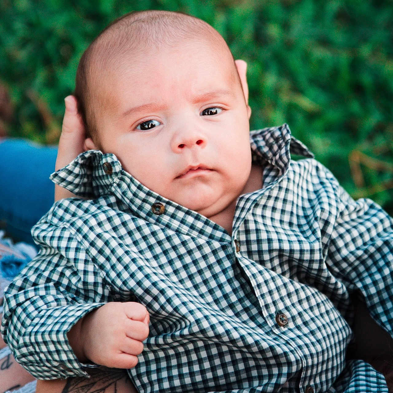 Jaxson joined the competition — help win amazing prizes! baby, bodypart, clothing, face, finger, frown, hand, happy, head, newborn, pants, person, photography, portrait, sad, shirt, sitting, skin, sleeve, tattoo