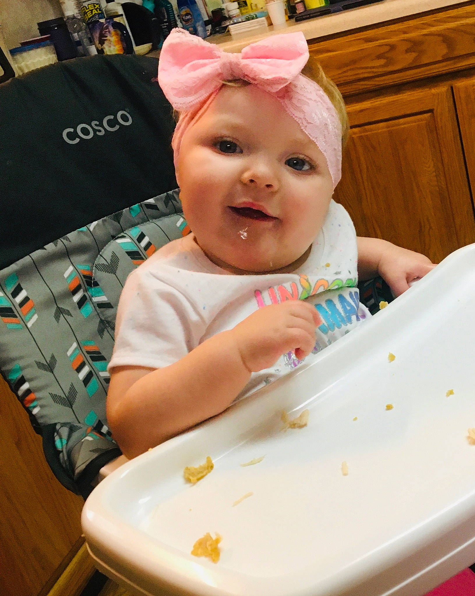 Marlie is registered to the contest to win money with this photo: baby, baby_food, cake, child, comfort_food, eating, food, headwear, person, toddler