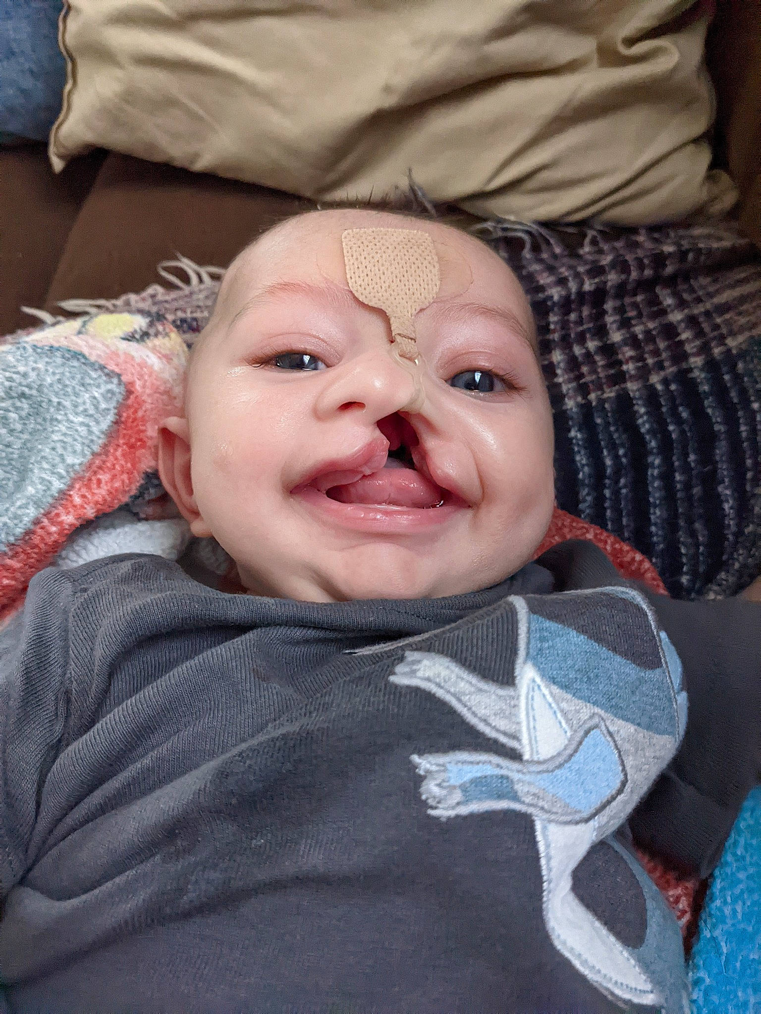 Merlin joined the competition — help win amazing prizes! baby, baby_laughing, baby_toddler_clothing, cheek, child, comfort, fun, gesture, happy, jaw, laugh, mouth, nose, person, portrait_photography, skin, sleeve, smile, toddler, tooth