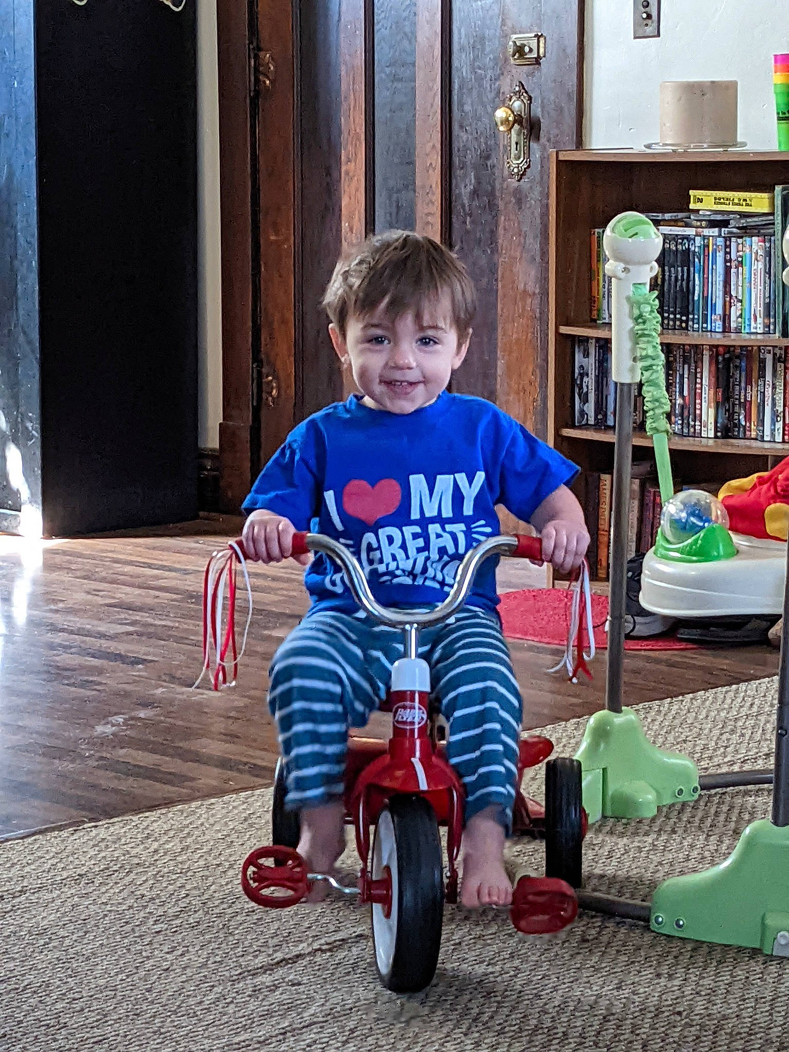 Weylin joined the competition — help win amazing prizes! automotive_tire, baby_toddler_clothing, bicycle, bicycle_tire, bookcase, door, fun, happy, joy, person, photograph, riding_toy, shelf, shelving, shoe, smile, standing, tire, toddler, tread