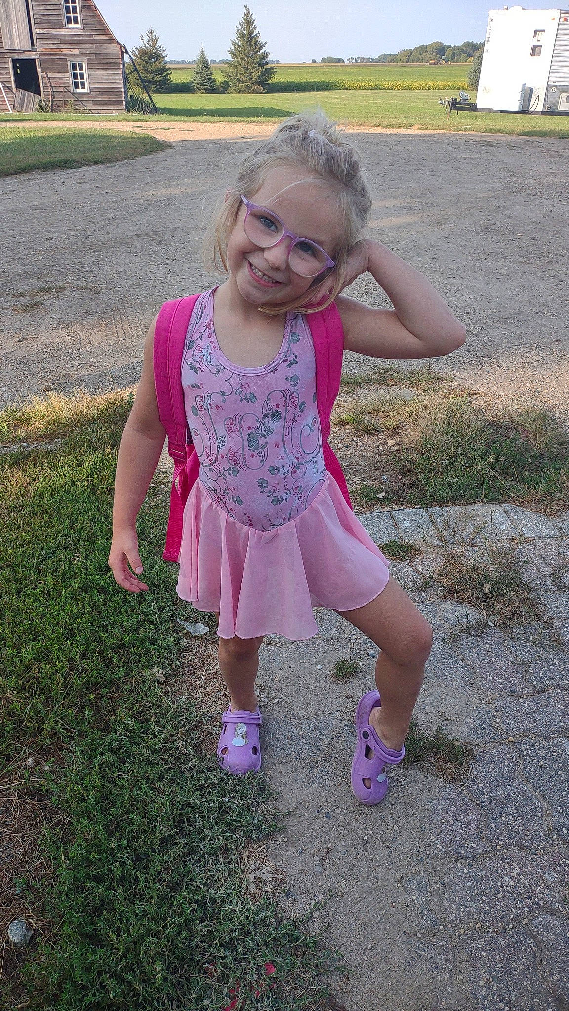 Paislee joined the competition — help win amazing prizes! baby_toddler_clothing, face, footwear, fun, grass, grass_family, hair, happy, head, human_leg, joy, lawn, leisure, magenta, people_in_nature, person, pink, plant, purple, smile