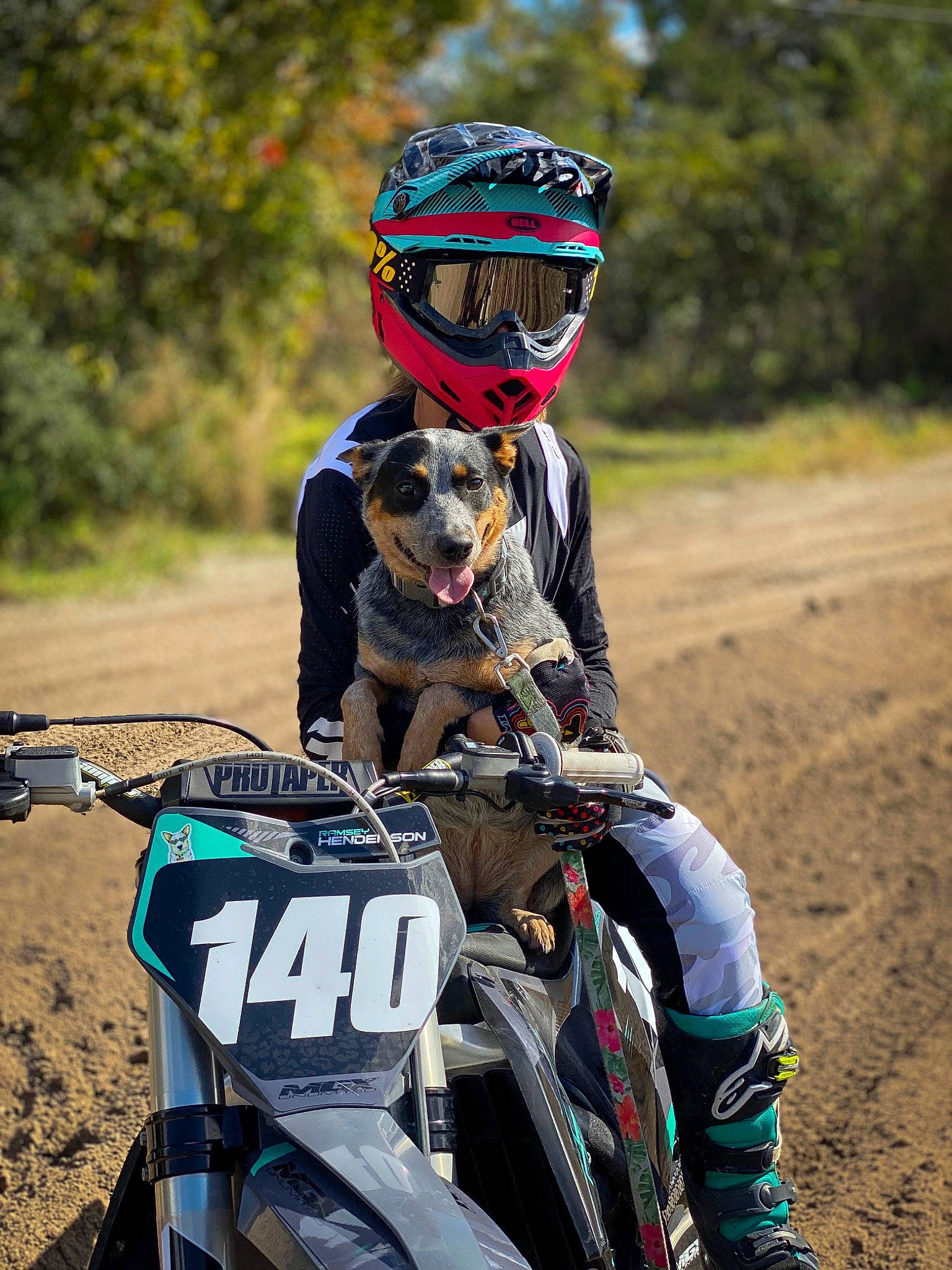 Macy-gray is registered to the contest to win money with this photo: adventure, bikejoring, canidae, downhill_mountain_biking, freeride, freestyle_motocross, helmet, motocross, motorcycle, off_roading, personal_protective_equipment, racing, soil, sporting_group, sports, vehicle