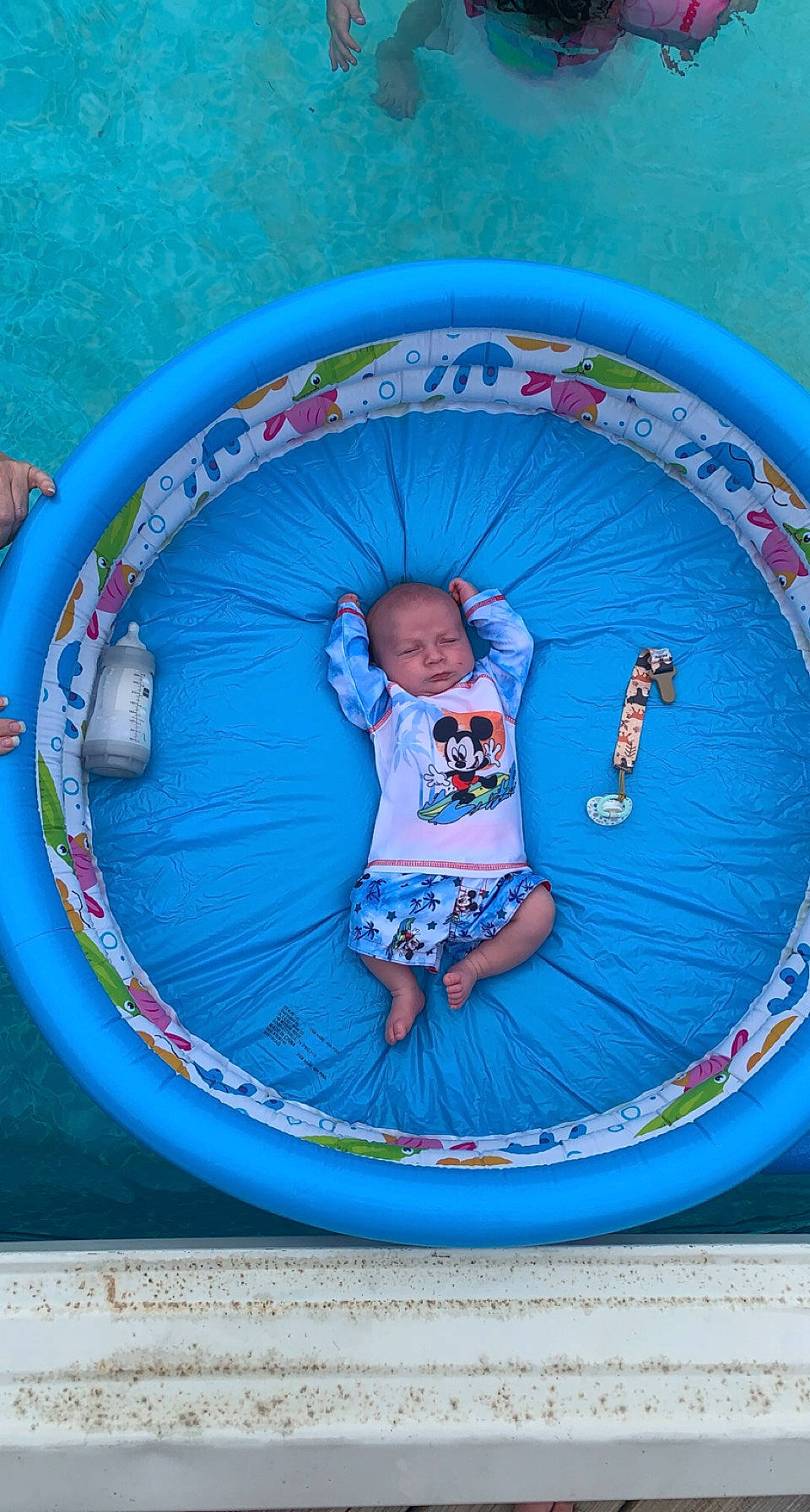 Drayven joined the competition — help win amazing prizes! aqua, azure, baby_toddler_clothing, blue, child, circle, electric_blue, fun, games, inflatable, leisure, person, pink, product, recreation, shorts, sleeve, t_shirt, toddler, vertebrate