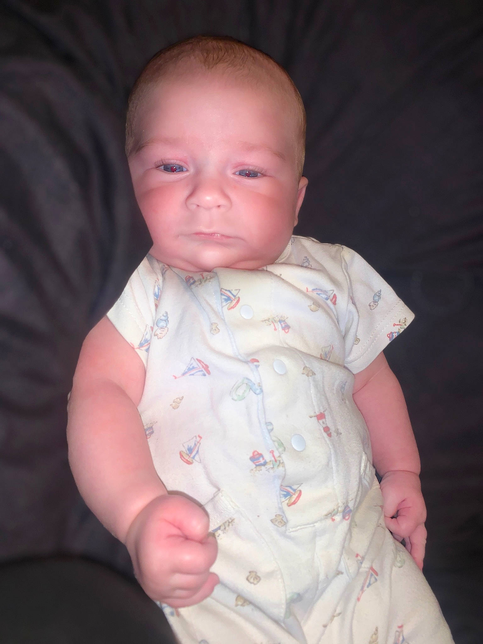 Drayven is registered to the contest to win money with this photo: arm, baby, baby_toddler_clothing, cheek, collar, comfort, eye, eyebrow, gesture, hand, iris, lip, mouth, neck, nose, person, skin, sleeve, stomach, thumb