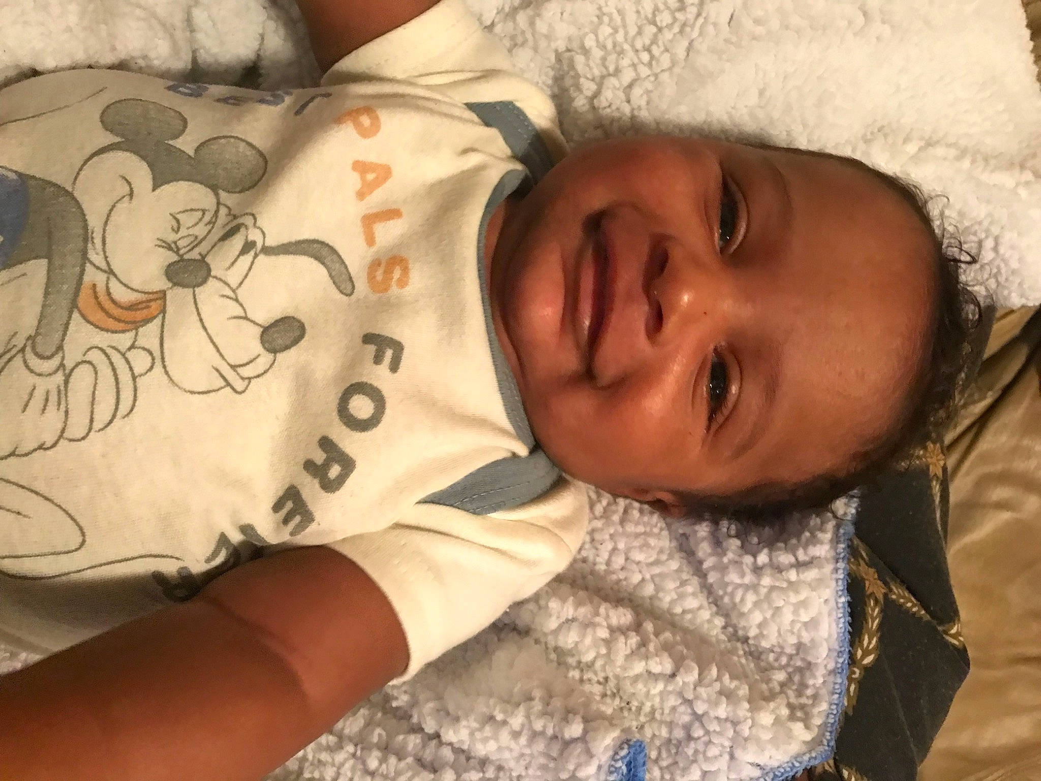 Legend is registered to the contest to win money with this photo: arm, baby, cheek, comfort, eye, eyebrow, finger, forehead, hair, hand, happy, head, human_body, joy, lip, mouth, neck, nose, person, skin