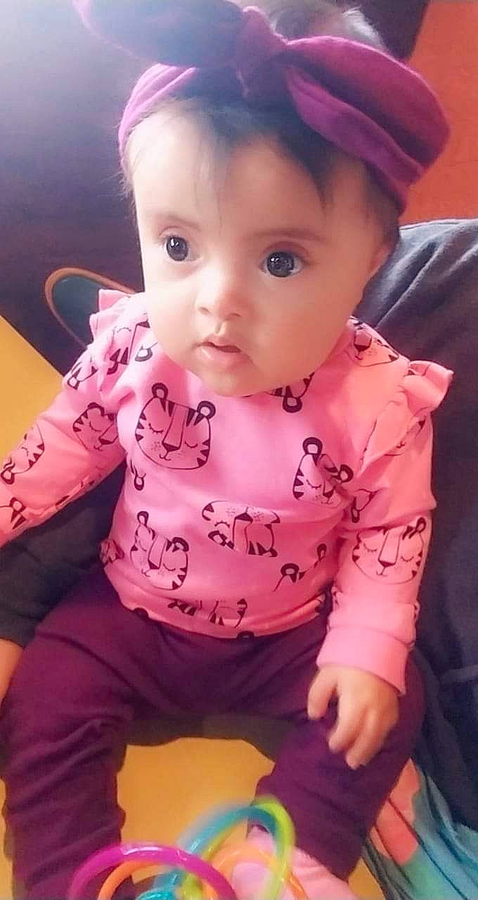 Ana joined the competition — help win amazing prizes! baby, baby_toddler_clothing, cheek, child, dress, eyelash, finger, fun, happy, iris, lip, magenta, mouth, nose, person, pink, purple, sitting, skin, sleeve