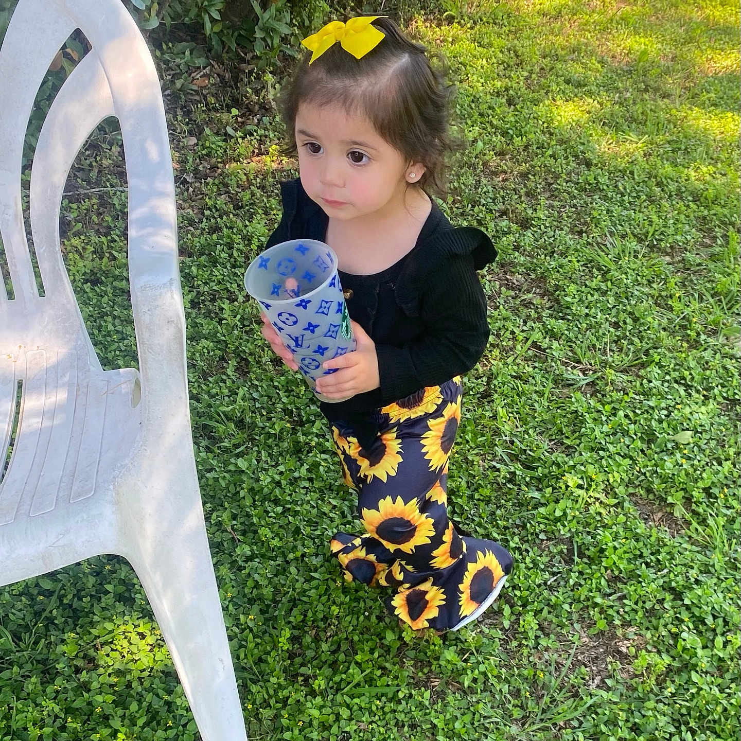 Rosalina is registered to the contest to win money with this photo: backyard, child, clothing, cream, dessert, face, female, food, girl, grass, head, icecream, nature, outdoors, person, photography, plant, portrait, summer, yard