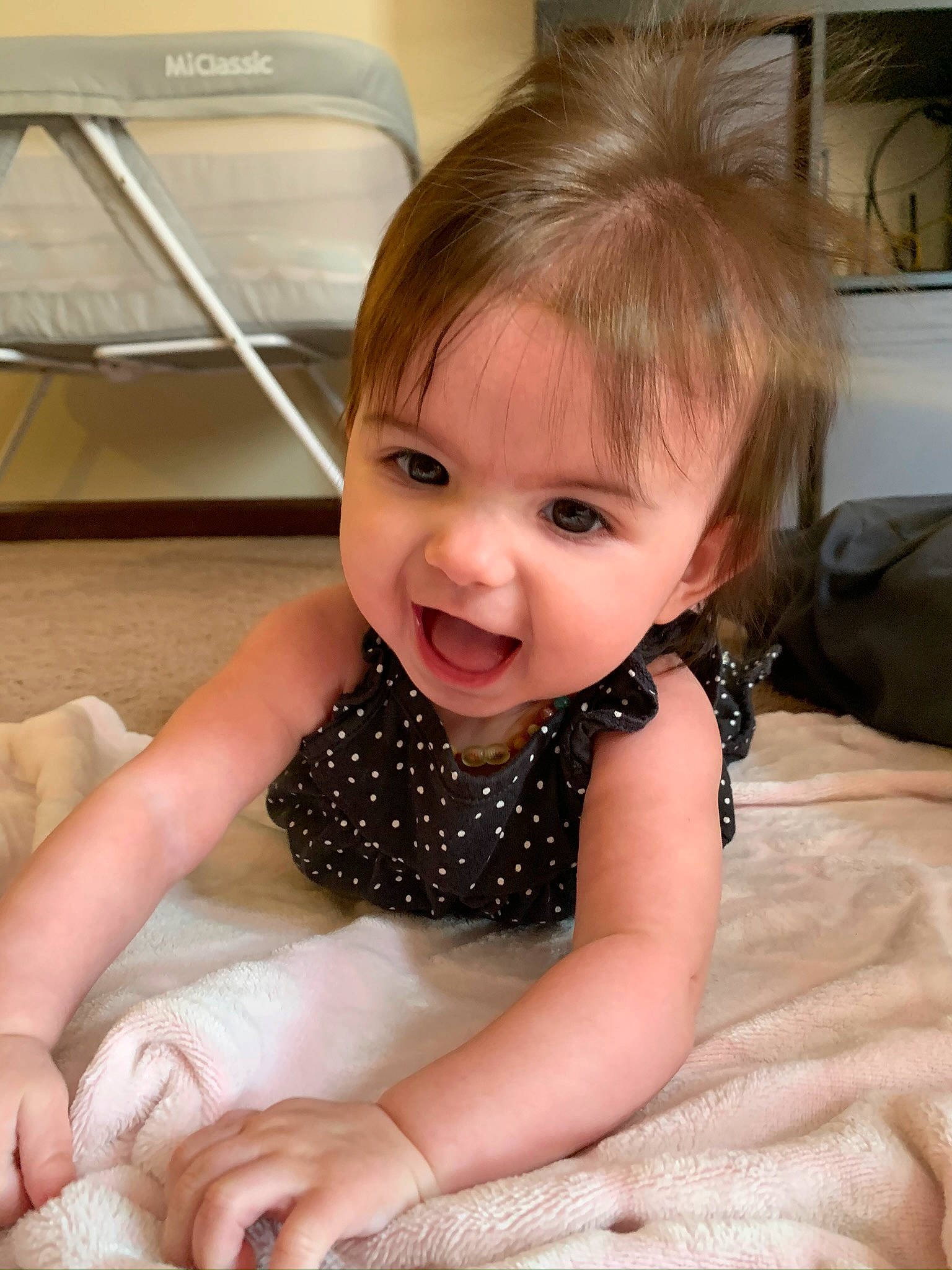 Mia is registered to the contest to win money with this photo: baby, beauty, brown_hair, cheek, child, ear, eye, face, nose, person, sitting, skin, smile, toddler