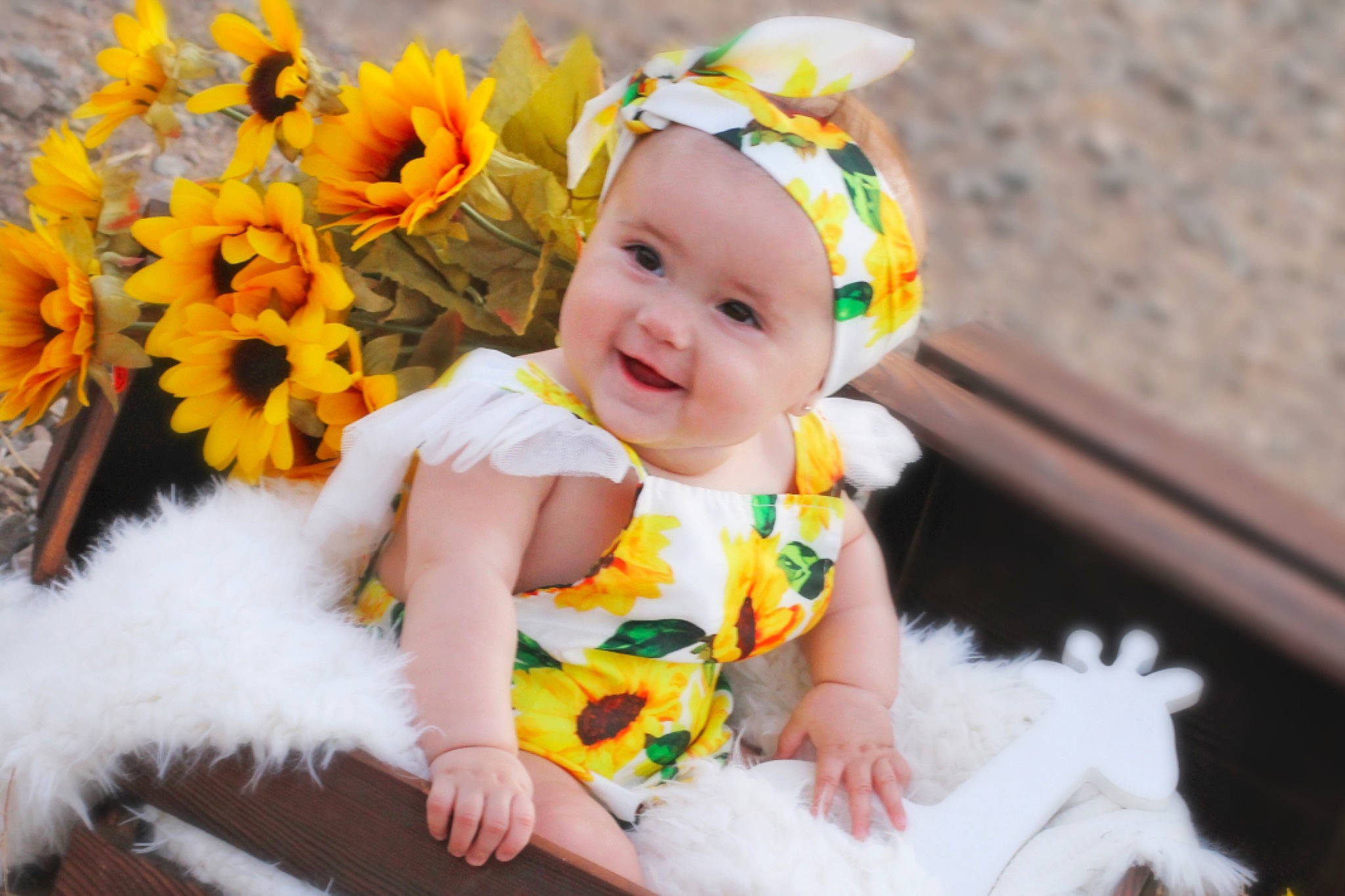 Blakely is registered to the contest to win money with this photo: baby, baby_toddler_clothing, child, costume, hair_accessory, happy, headband, headwear, person, toddler, yellow